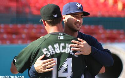  Ryan Braun embraces Gaby Sanchez during batting practice prior to Tuesday's game between the Milwaukee Brewers and Florida Marlins.